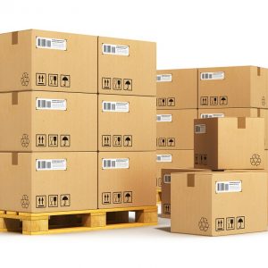 Creative cargo delivery and transportation logistics storage warehouse industry business concept: group of stacked corrugated cardboard boxes on wooden shipping pallets isolated on white background